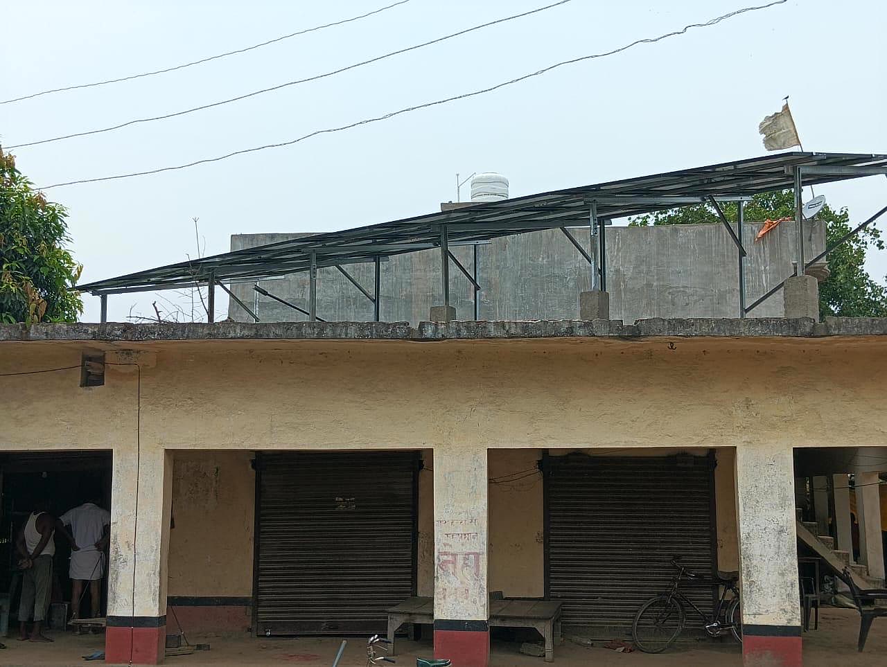 Commercial rooftop solar array installed above a market complex